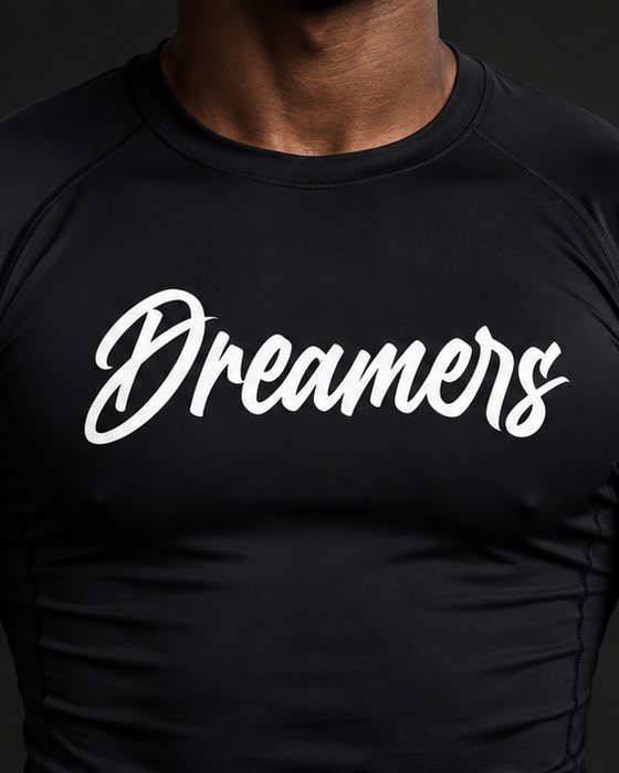 The Dreamers compression tee with the script across the chest